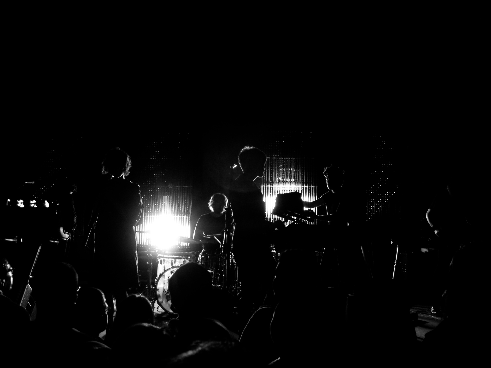 Band playing in a crowd.